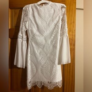 White bell sleeve lace dress